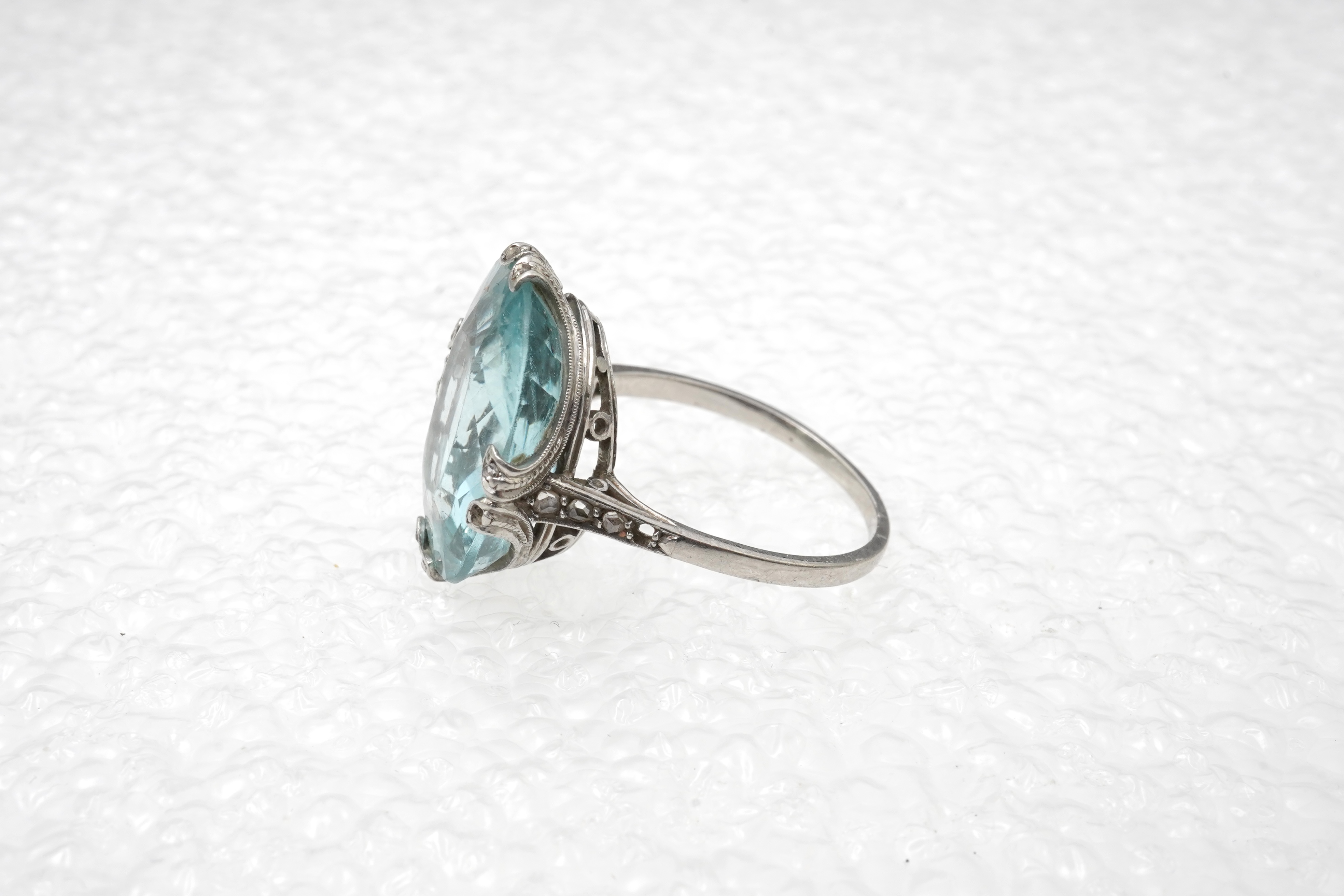 An attractive Belle Epoque aquamarine and diamond ring, early 20th century